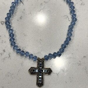 HEIDI DAUS stunning cross with blue Swavorski crystals measuring 2”x 1 1/2”.